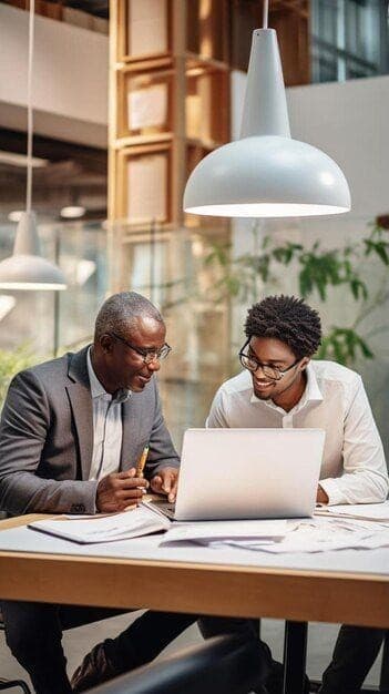Employees collaborating around work admin tasks
